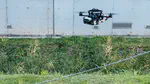 Autonomous Power Line Inspection with Drones via Perception-Aware MPC